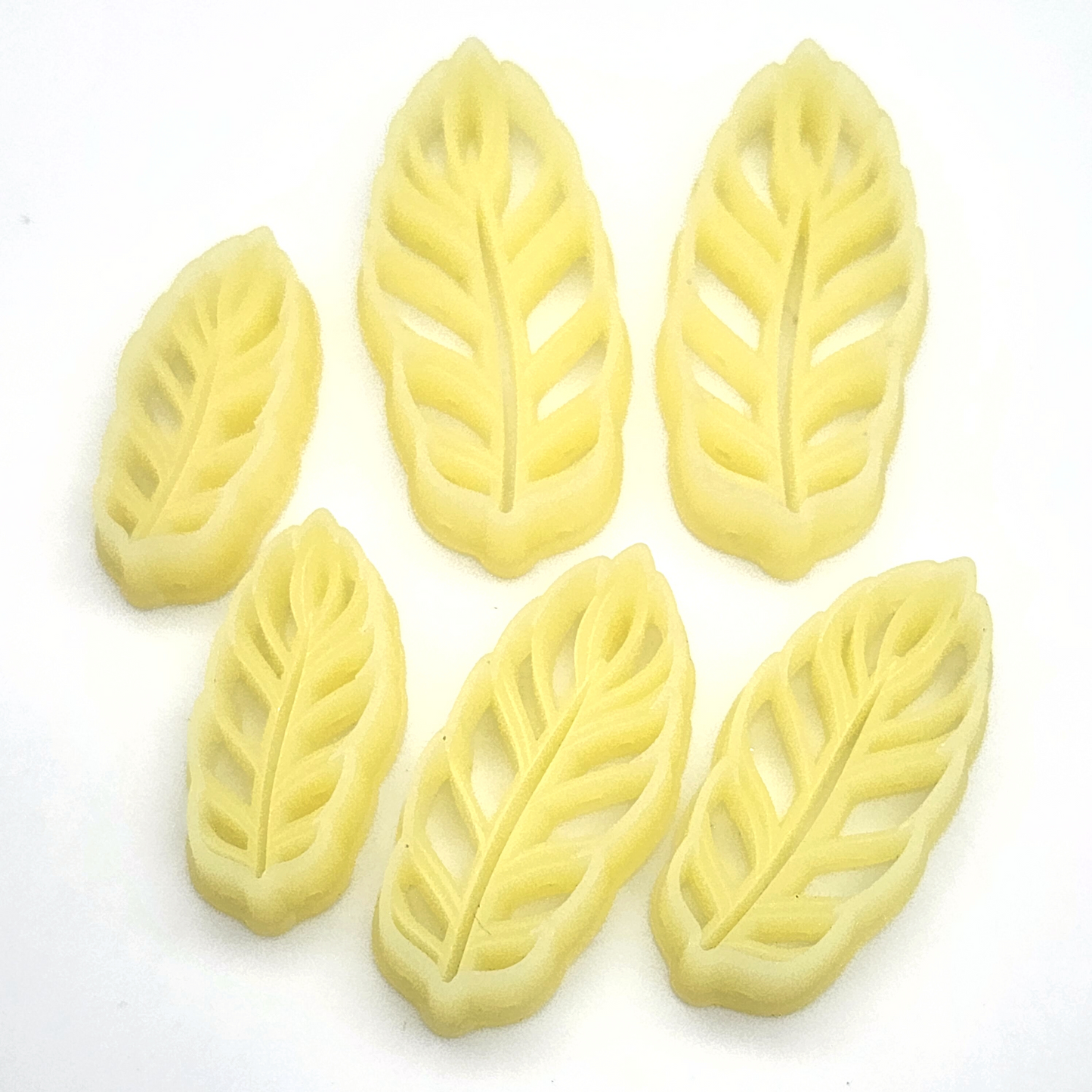 multiple feather cutters in various sizes