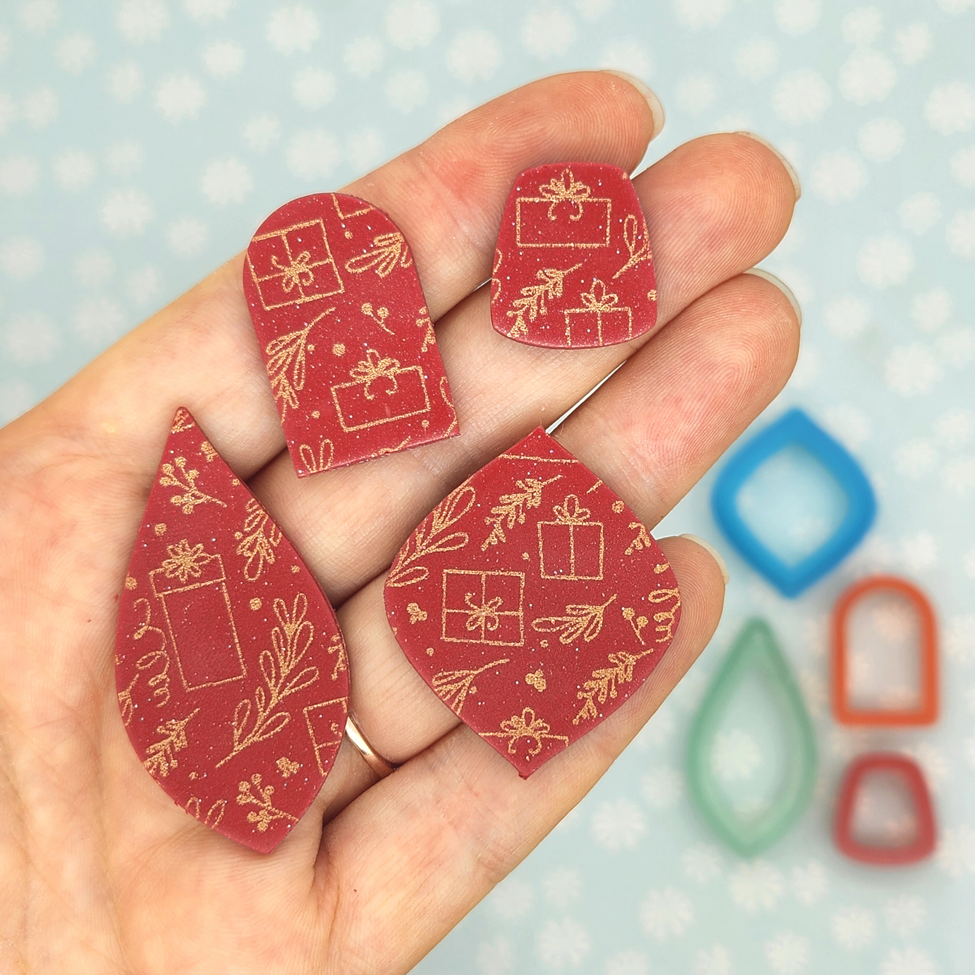 actual sample of Yuletide Gifts silk screen pattern on polymer clay shapes