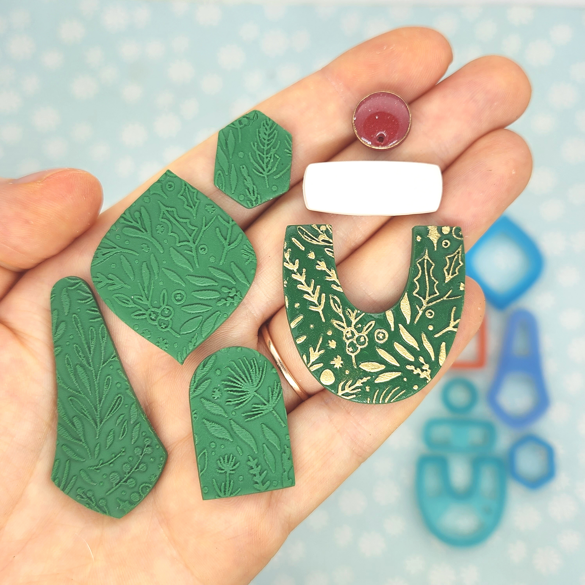 actual sample of Winter Boughs and Berries texture pattern on polymer clay shapes