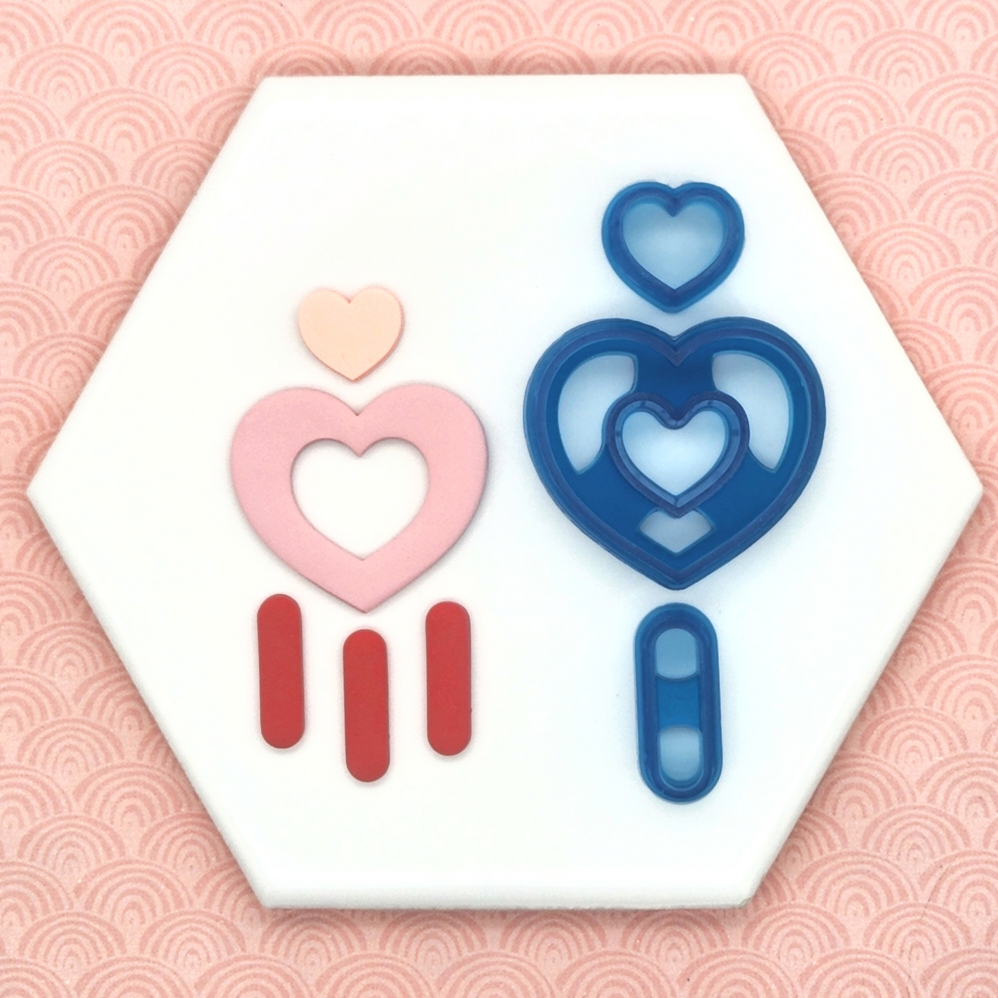 Chelsea heart dangle set sample on polymer clay , and chelsea heart dangle set polymer clay cutter. The chelsea heart dangle set, three piece heart clay cutter, consists of a stud size heart, bigger heart, and a bar.