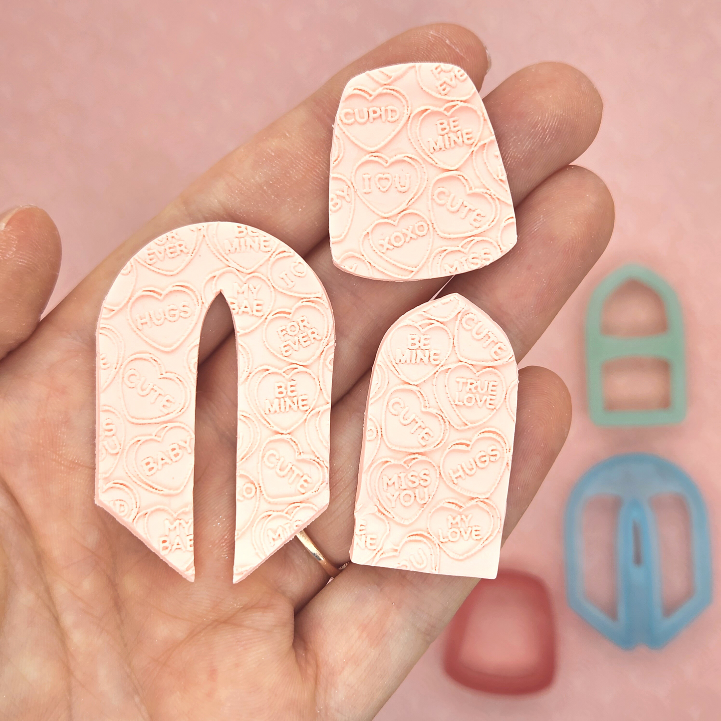 sample output or finish product of Candy Hearts Texture Sheet on polymer clay shapes