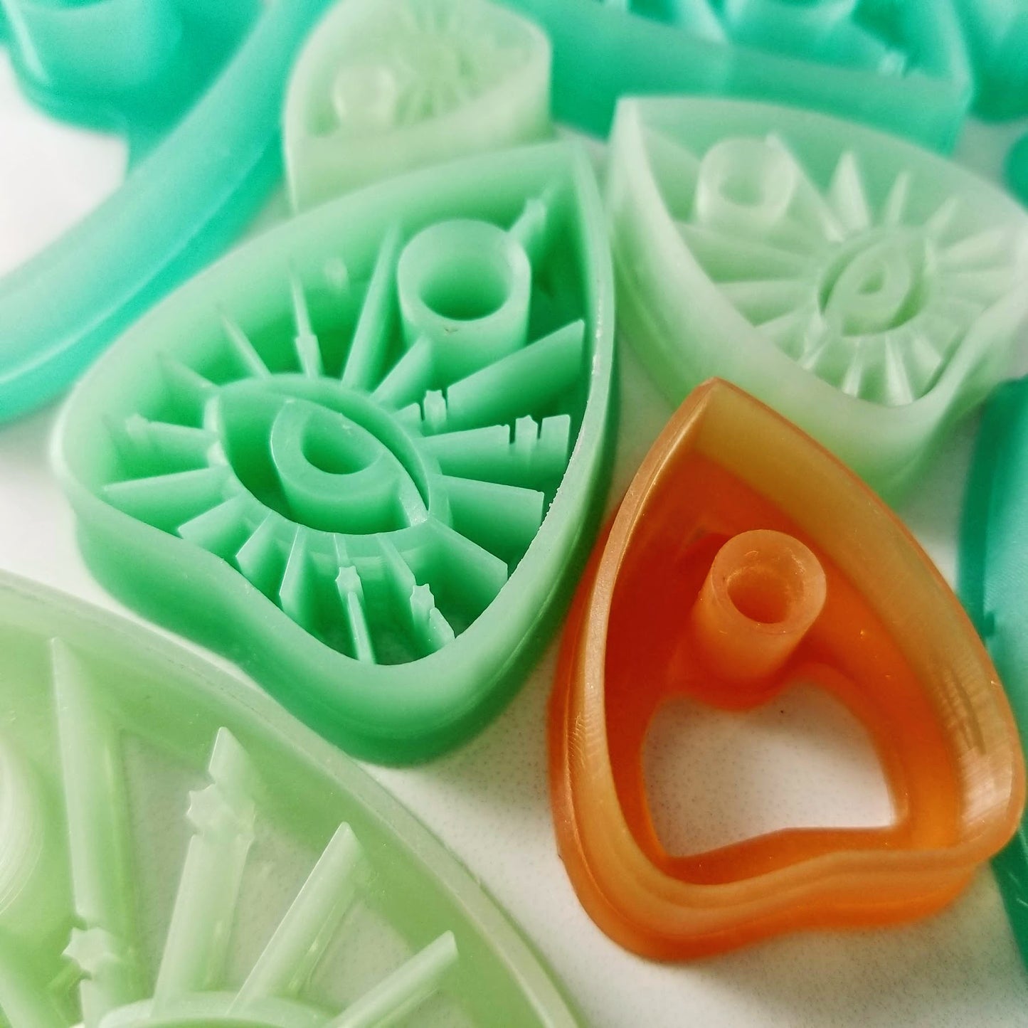 Closeup of Ouija Board Planchette Polymer Clay Cutters so you can see charp edges