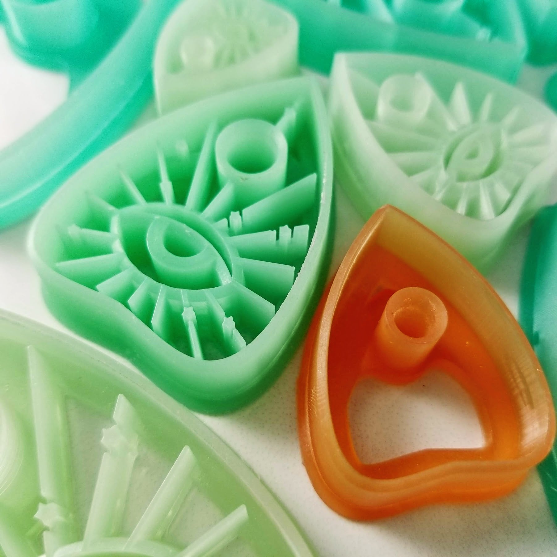 Closeup of Ouija Board Planchette Polymer Clay Cutters so you can see charp edges