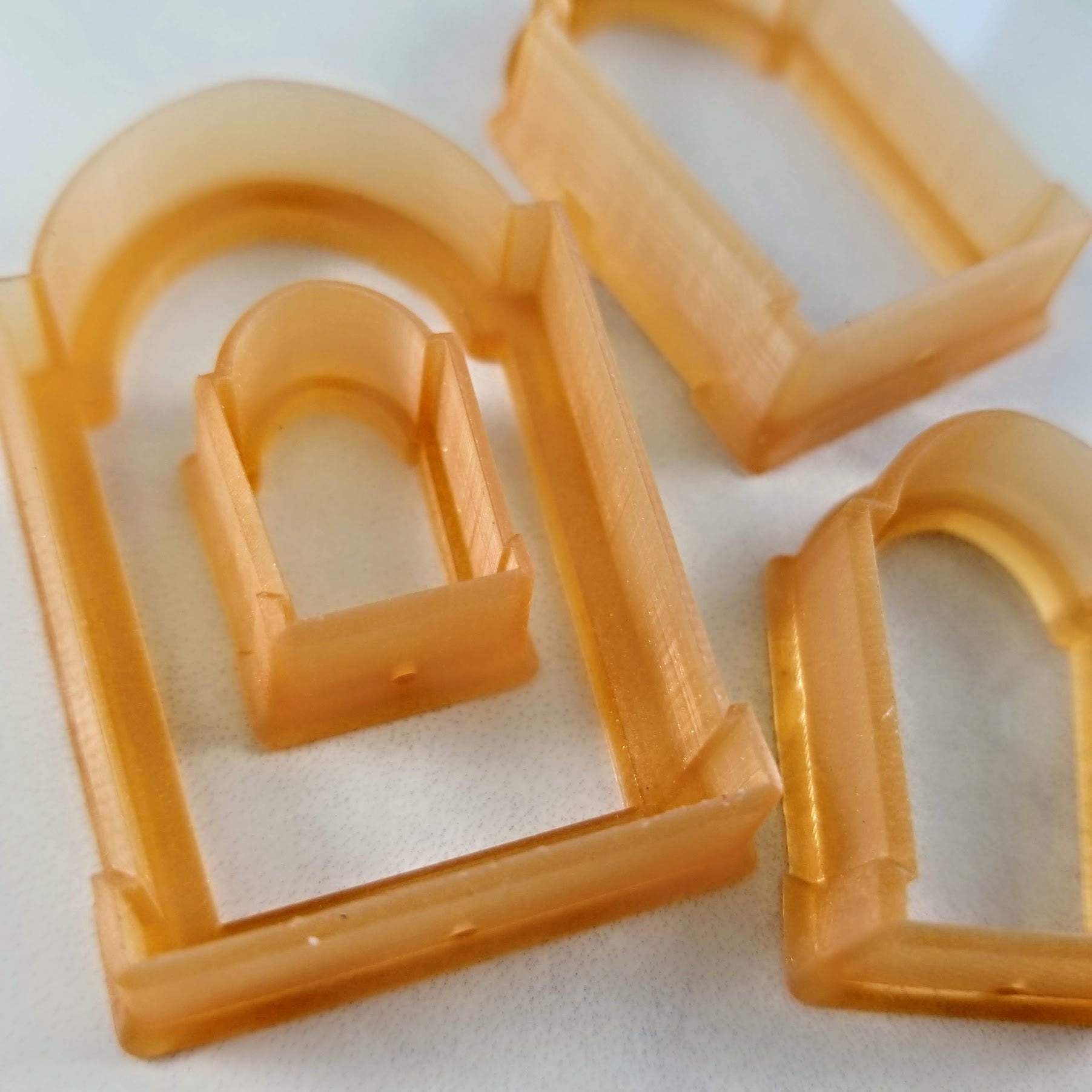 Gravestone polymer clay cutters closeup to show how sharp they are and how clean they will cut.