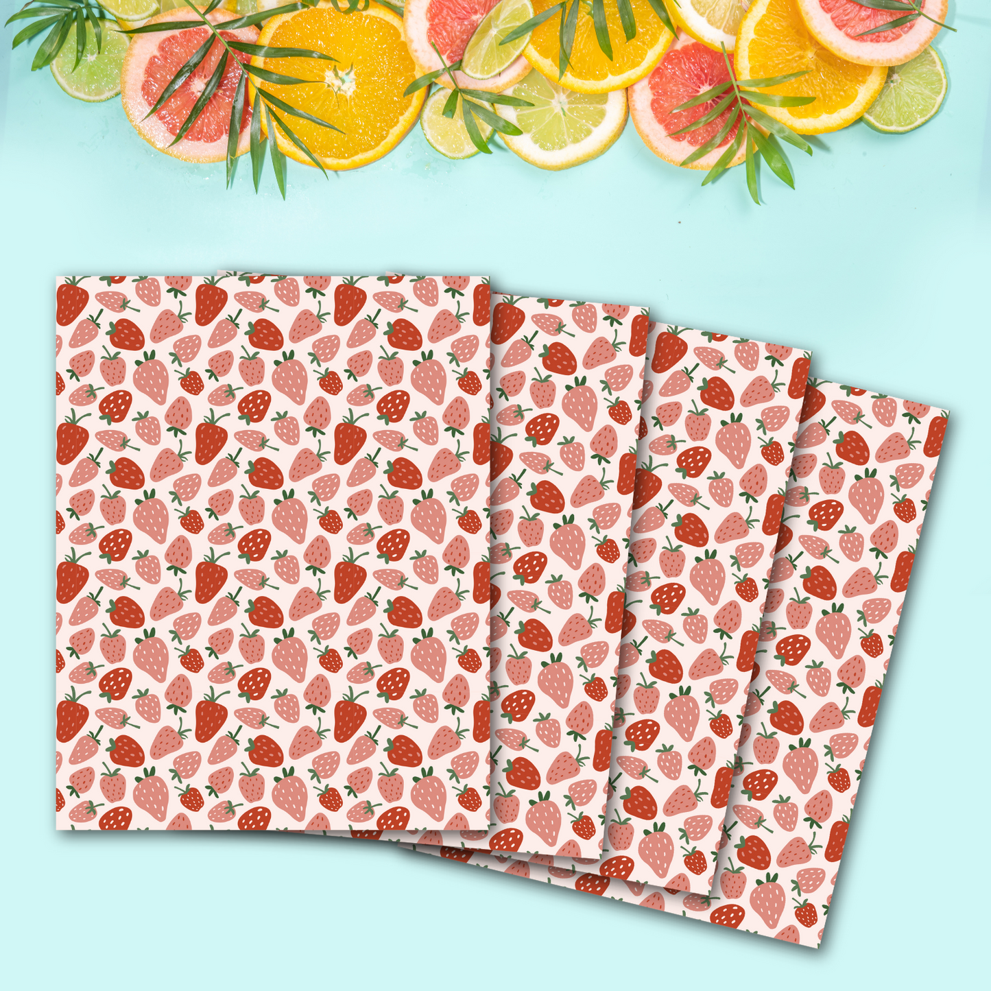 A set of four strawberry-patterned transfer sheets laid out, ideal for creative polymer clay designs.