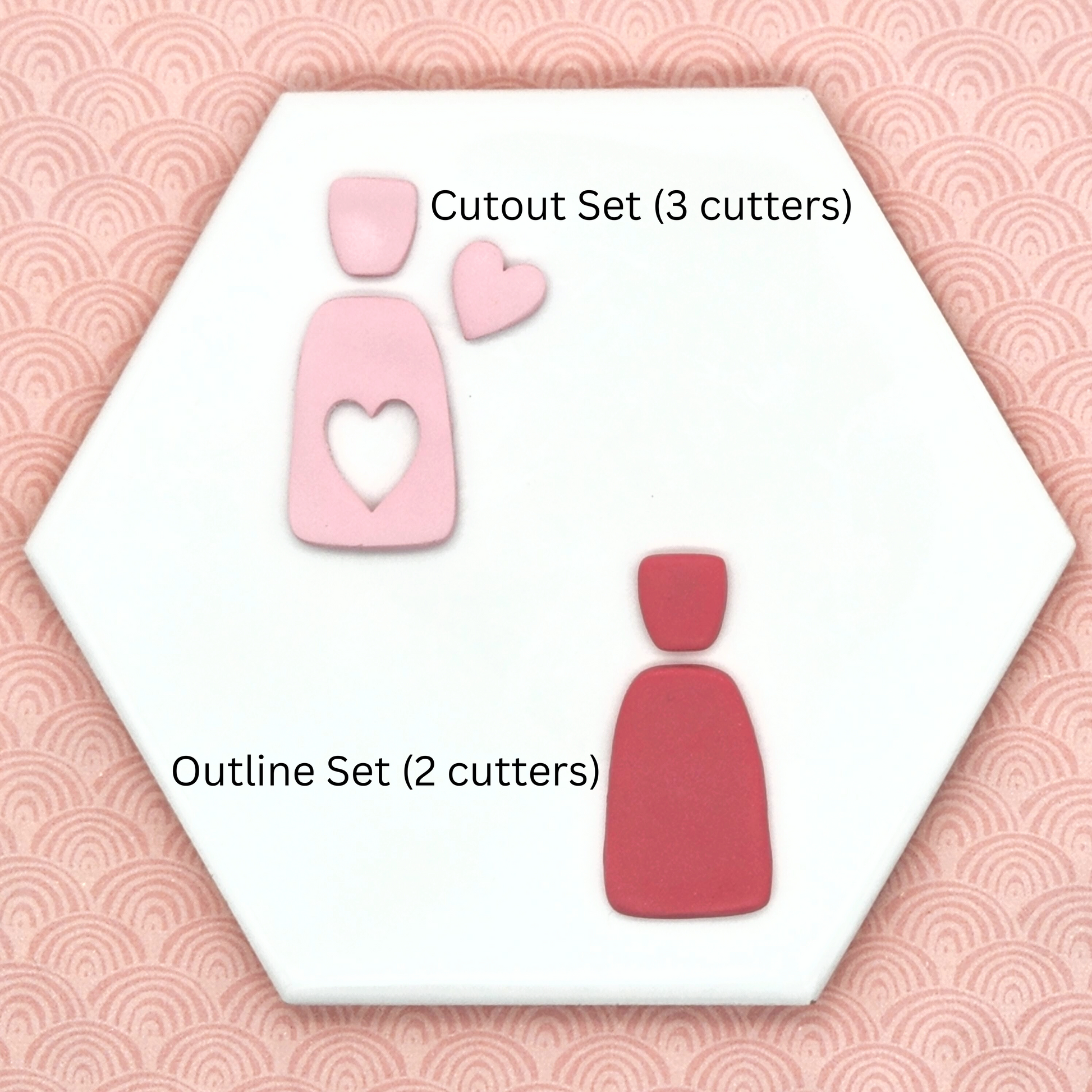 Shows comparison of Amara set's outline and cutout set sample in polymer clay. outline set: two piece shape cutters including stud and dangle, and cutout set: three piece set cutters including stud, dangle and heart shaped cutter