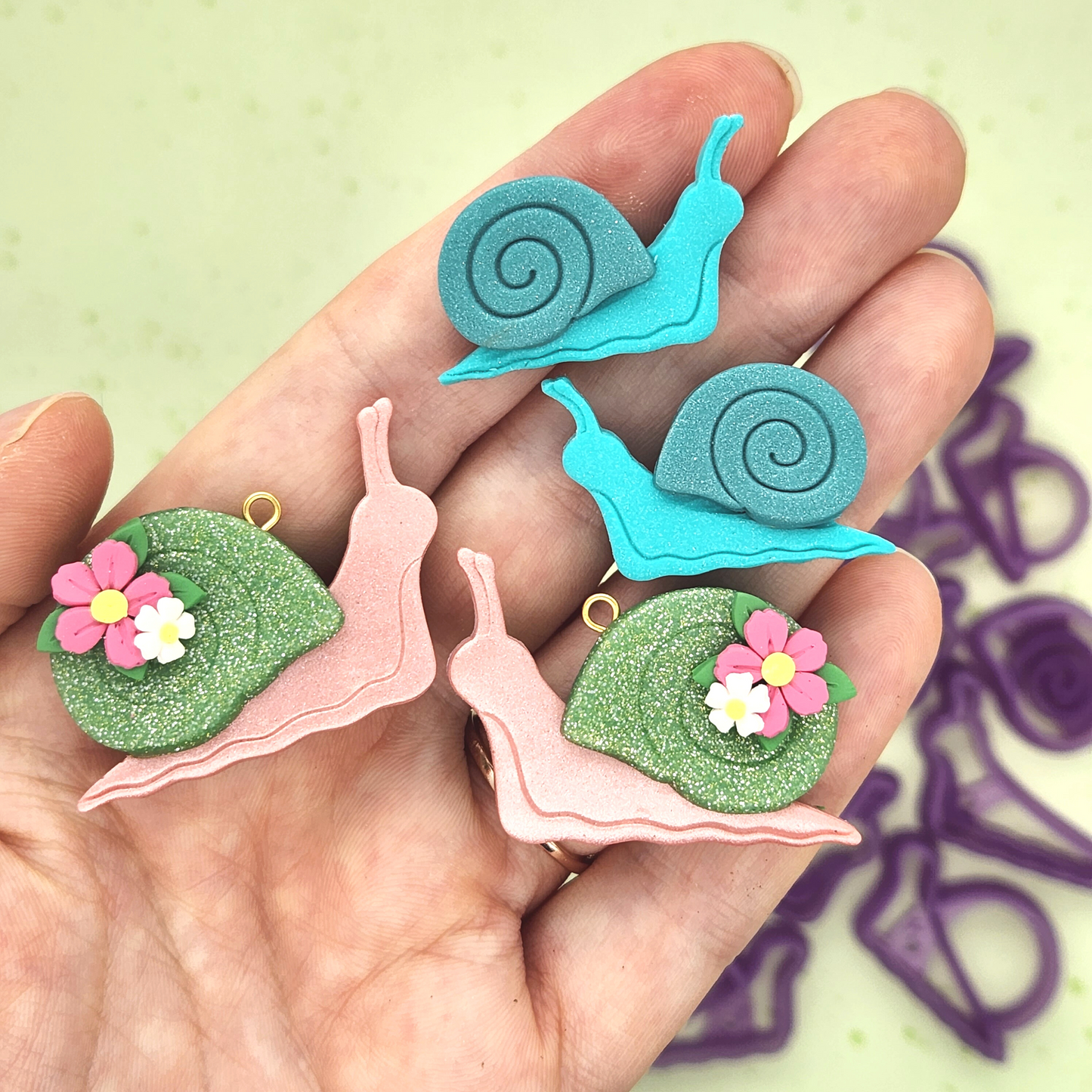 Comparison of Snail mirrored sets sizes on sample finish product polymer clay