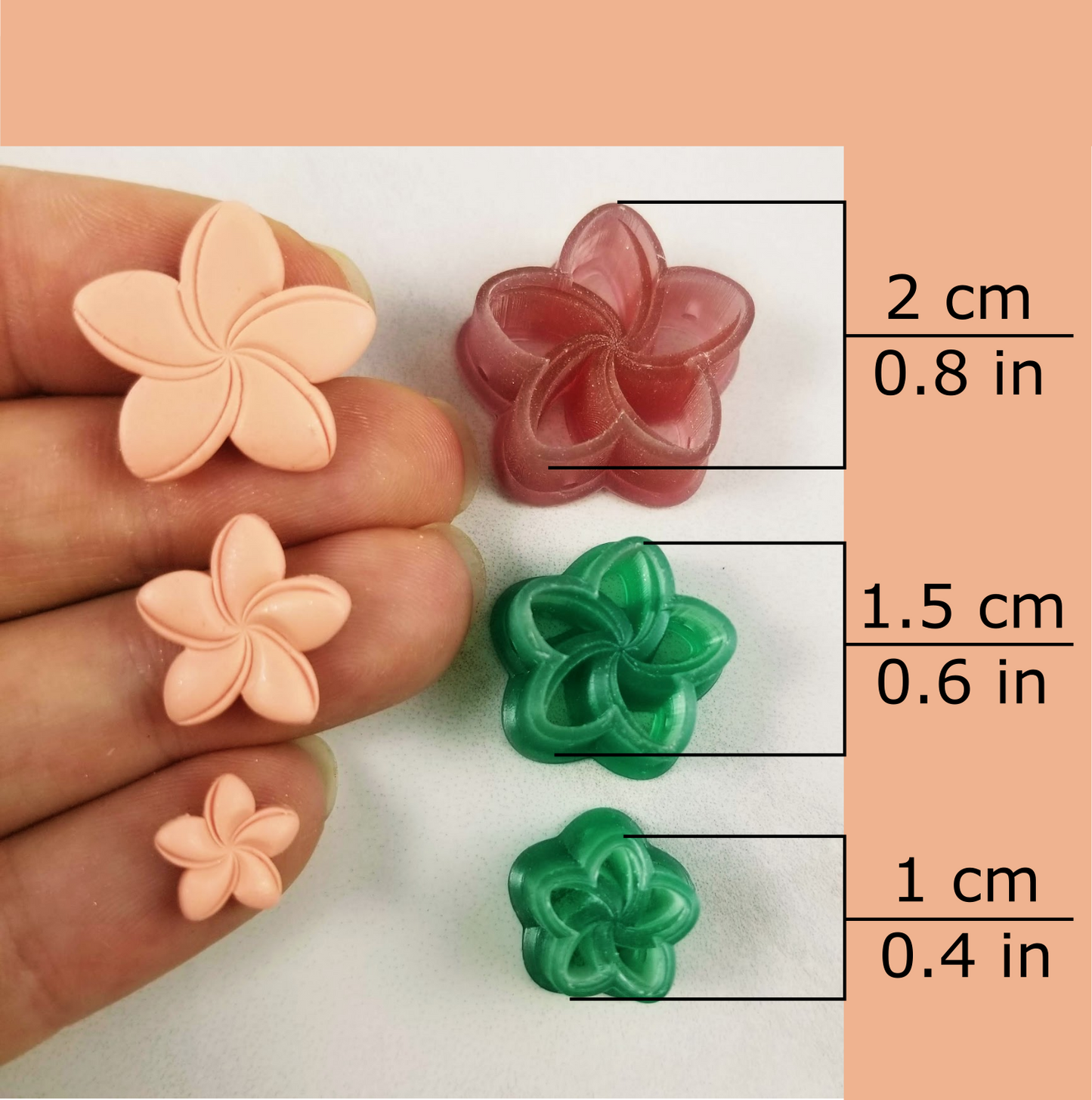 Plumeria polymer clay cutter available sizes, 2 centimeters / 0.8 inches, 1.5 centimeters / 0.6 inches, 0.5 centimeter / 0.2 inches