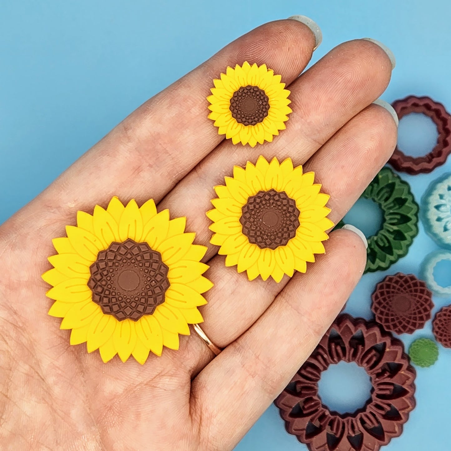 Sunflower Polymer Clay Cutters.  All Sizes on Hand for Scale. 